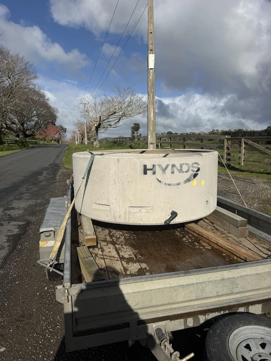 Large item secured on the open trailer